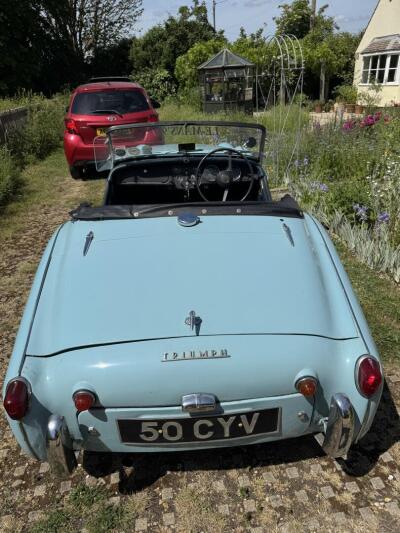 1959 TR3A in stunning powder blue.
