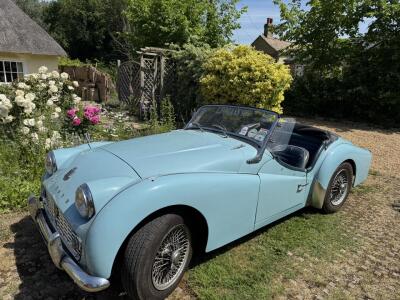 1959 TR3A in stunning powder blue.