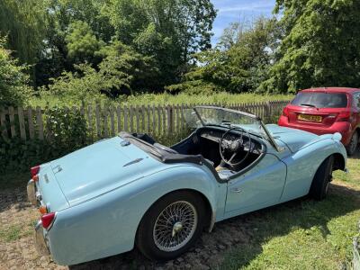 1959 TR3A in stunning powder blue.