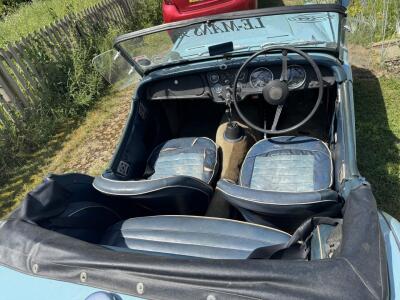1959 TR3A in stunning powder blue.