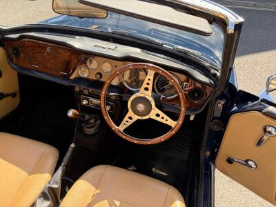 1973 TRH. Sapphire Blue with Tan interior and Walnut Dashboard.