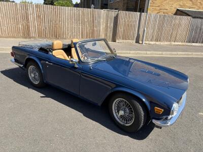 1973 TRH. Sapphire Blue with Tan interior and Walnut Dashboard.