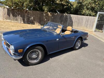 1973 TRH. Sapphire Blue with Tan interior and Walnut Dashboard.