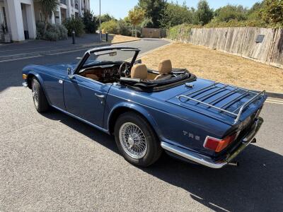 1973 TRH. Sapphire Blue with Tan interior and Walnut Dashboard.