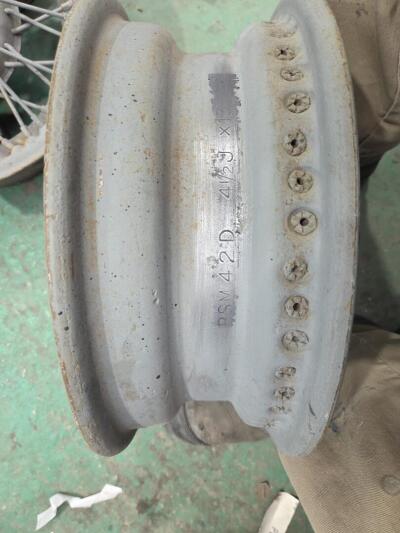 Four original Tr2/3 wire wheels