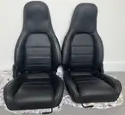 Immaculate Mazda MX5 full leather seats, with silver stitching, seats including fitting kit and instructions. Uses existing TR seat fixing bolts.