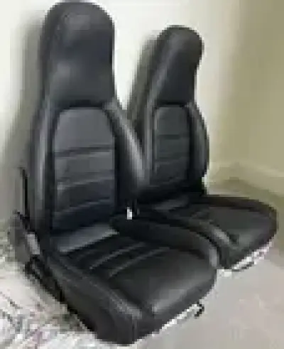 Immaculate Mazda MX5 full leather seats, with silver stitching, seats including fitting kit and instructions. Uses existing TR seat fixing bolts.