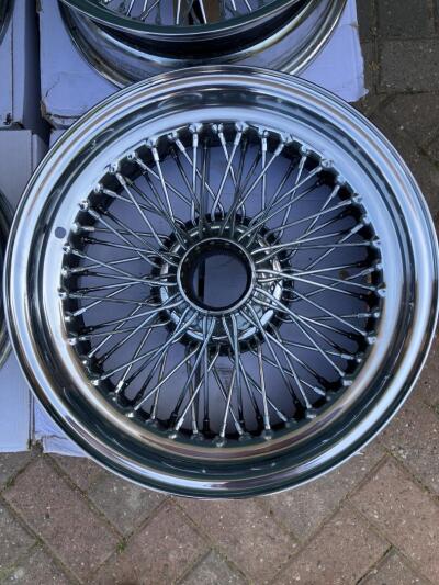 MWS wire wheels for TR6. 4 chrome 6” wide and 1 x silver 5.5”