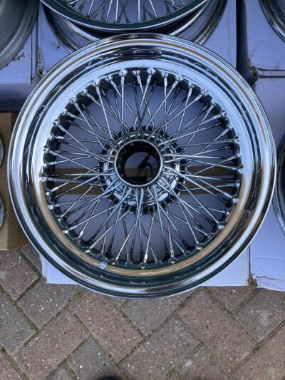MWS wire wheels for TR6. 4 chrome 6” wide and 1 x silver 5.5”