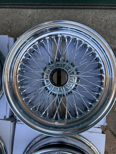 MWS wire wheels for TR6. 4 chrome 6” wide and 1 x silver 5.5”