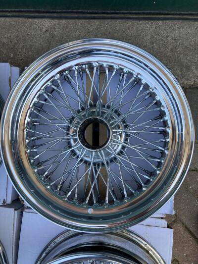 MWS wire wheels for TR6. 4 chrome 6” wide and 1 x silver 5.5”