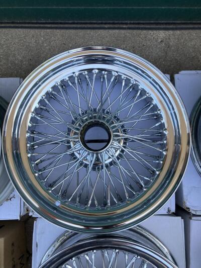 MWS wire wheels for TR6. 4 chrome 6” wide and 1 x silver 5.5”