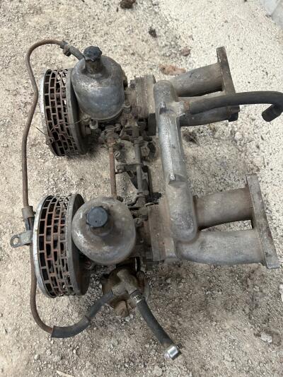 TR4A SU twin Carburettors and manifold.