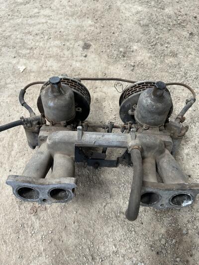 TR4A SU twin Carburettors and manifold.