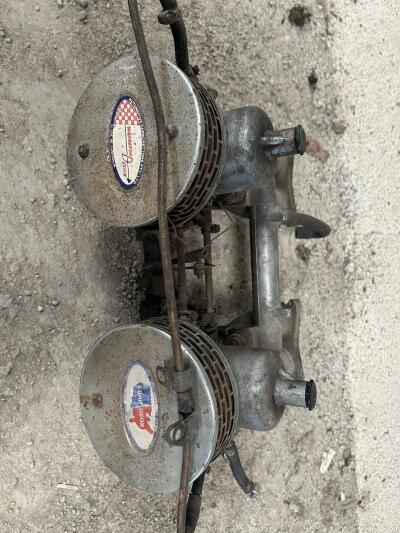 TR4A SU twin Carburettors and manifold.