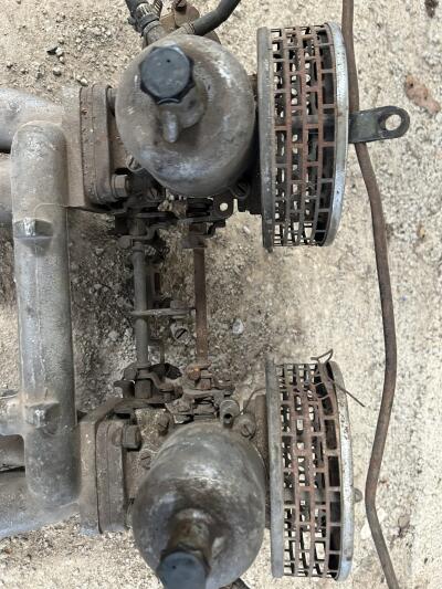 TR4A SU twin Carburettors and manifold.