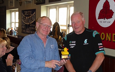 Chris receives his award for the best splash at Duntisbourne Ford from Noel