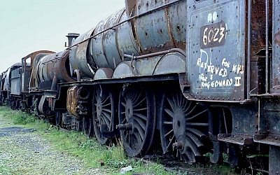 How 6023 looked before restoration at Dai Woodham's scrap yard, Barry, including butchered wheels.