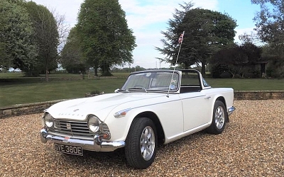 Eric Mobley's well known TR4A on his recently re-modelled driveway!!!!
