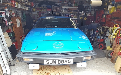 One of Russ and Jo Cooper's TR7s in its cosy garage