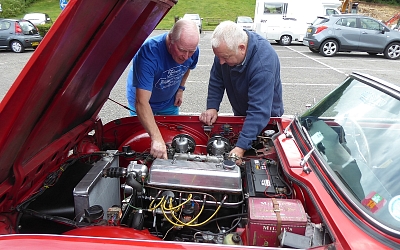 Inspecting Chris's newly rebuilt engine.